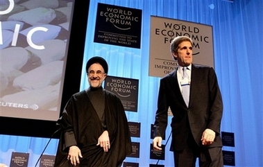 Kerry removes mouth from Khatami's ass