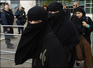 Women believed to be family members of some of the men arrested on suspicion of terrorism leave the Brampton courthouse yesterday.